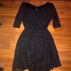 By by woman’s dress size small black and gold shimmer rose patterned